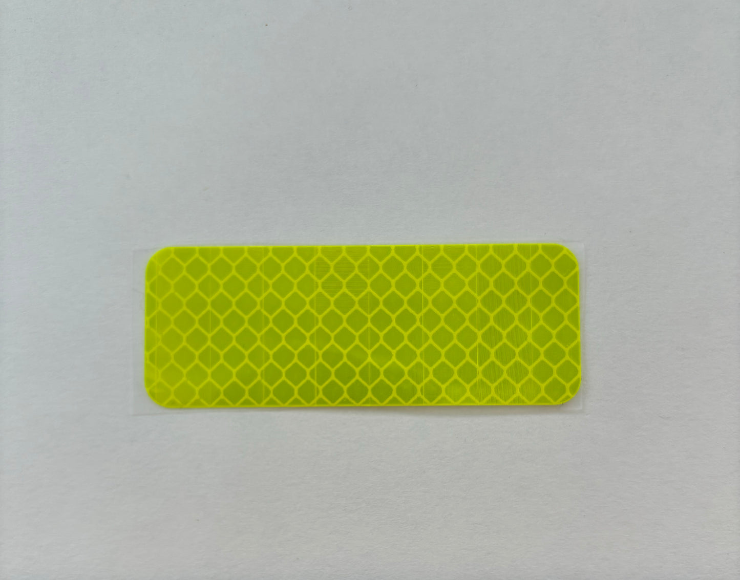 Rechteckiger Reflektor-Aufkleber in leuchtgrün, 3cm x 8cm (1stk)
