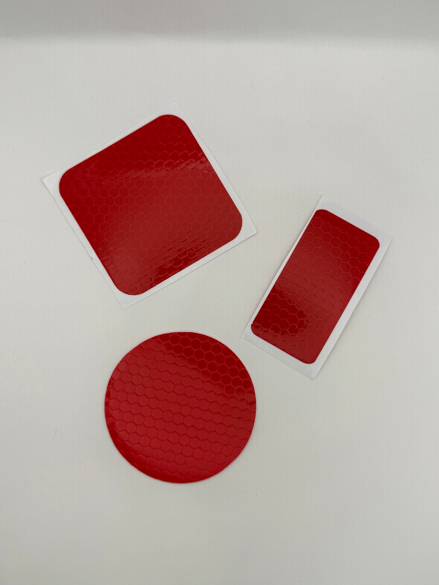 Reflektierende Sticker, rund, quadratisch und rechteckig in rot (3stk)