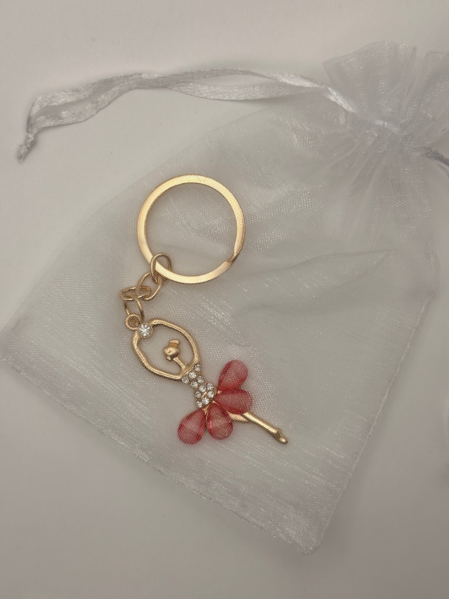 Ballerina-Schlüsselanhänger mit Glitzersteinen, gold/rosa