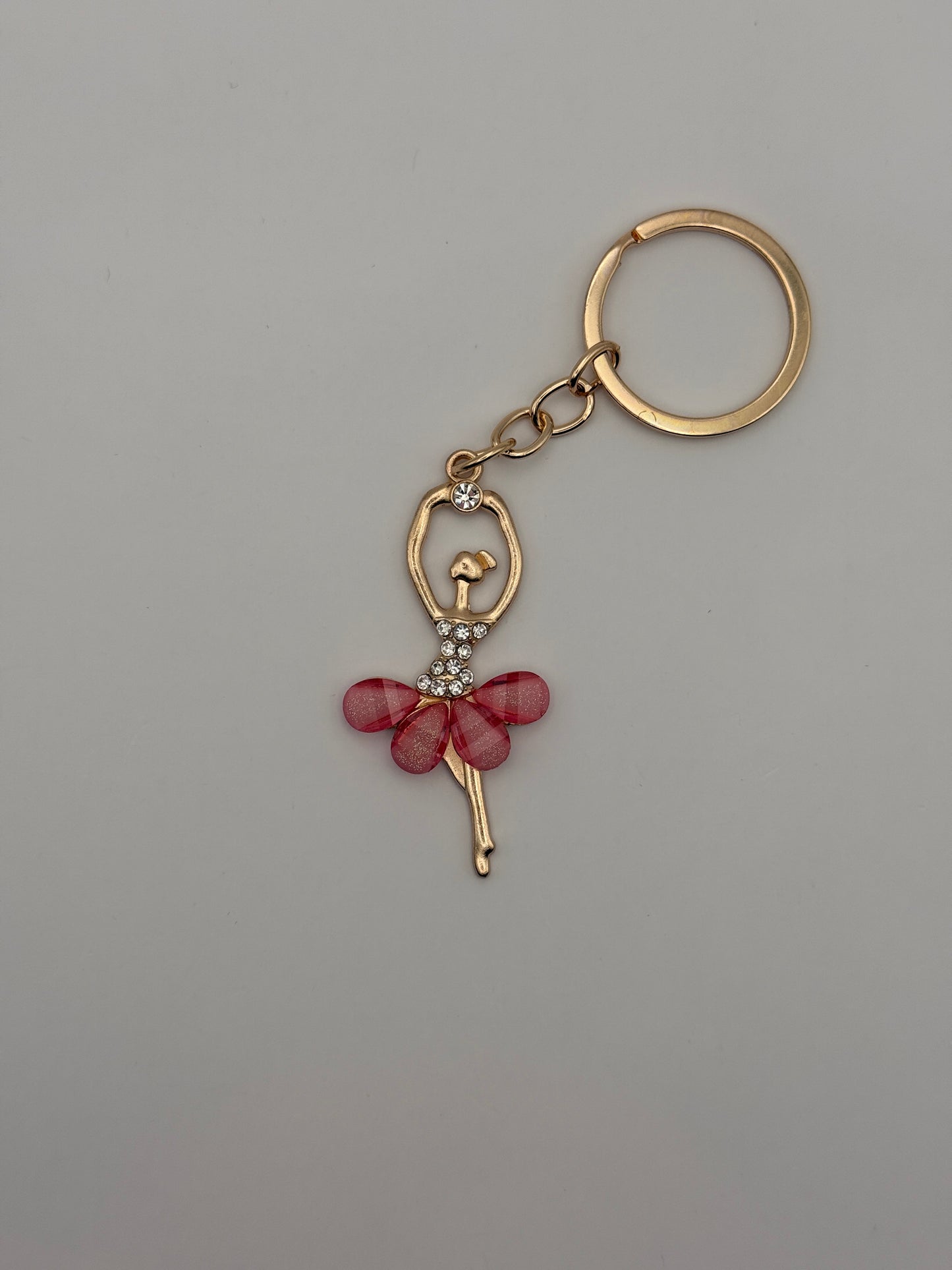 Ballerina-Schlüsselanhänger mit Glitzersteinen, gold/rosa